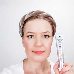 women holding It Cosmetics CC Cream