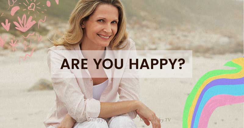 future image for post about finding happiness from within with mature beautiful women sitting on the beach and smiling
