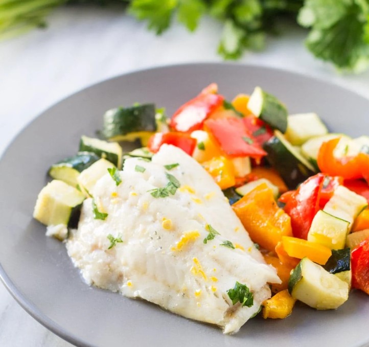 10+ Healthy & Quick Summer Dinners | low FODMAP diet 21 Fish Fillet with Roasted Veggies on a plate