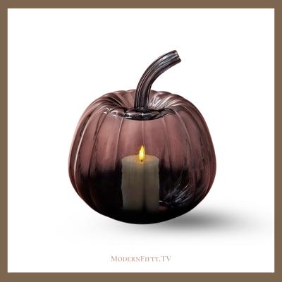 Black glass pumpkin with candle