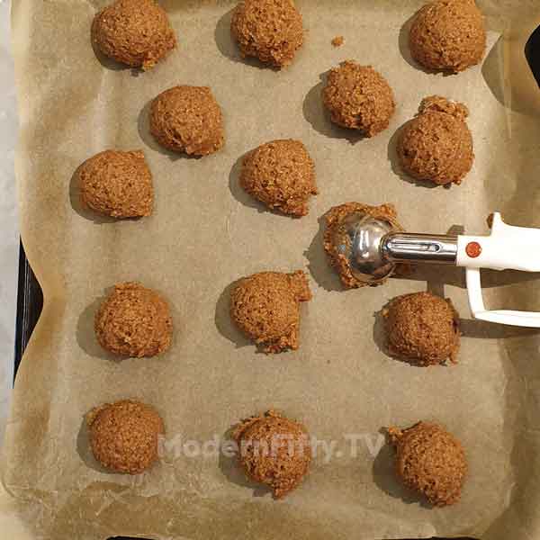Low Carb Pumpkin Spice Cookies - KETO 9 Scooping cookie dough with ice-cream scoop