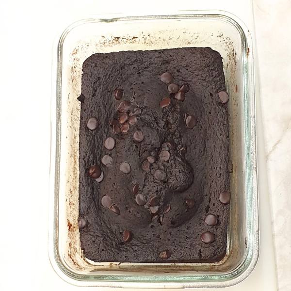Cook in the microwave for 5 minutes. Cooking time may vary. Start with 5 minutes and test if the center is cooked with a toothpick.